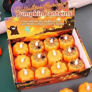 Set of 12 orange Halloween pumpkin LED candle lights in a decorative display box for parties