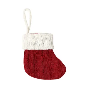 Classic red and white cable knit mini Christmas stocking ornament for tree decoration.