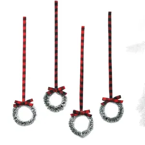 Decorative set of 4 mini Christmas wreaths featuring red and black buffalo plaid bow ribbons