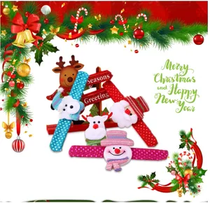 Detailed view of festive Christmas slap bracelets featuring Santa, snowman, and reindeer.