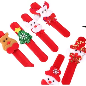 Detailed view of red Christmas slap bracelets featuring snowman and reindeer