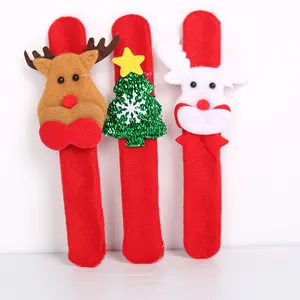 Three red Christmas slap bracelets for kids featuring reindeer and tree decorations