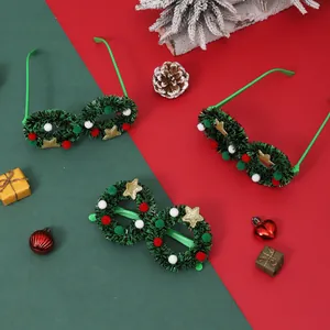 Set of three festive Christmas wreath glasses frames decorated with colorful pom-poms