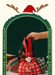 Sacs à cadeaux de Noël en toile avec cordon de serrage et motifs de Père Noël festifs