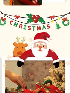 Detail der roten apfelförmigen Weihnachtsgeschenkbox mit grünem Griff