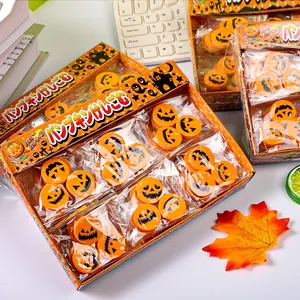 Creative Halloween pumpkin erasers with cute expressions in festive display boxes.