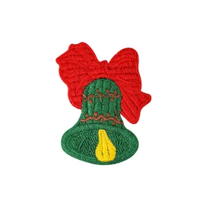 Pince à cheveux brodée en forme de cloche de Noël avec un joli grand nœud rouge