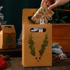 Festive reindeer kraft paper gift bag with unique 3D evergreen antler decorations for Christmas