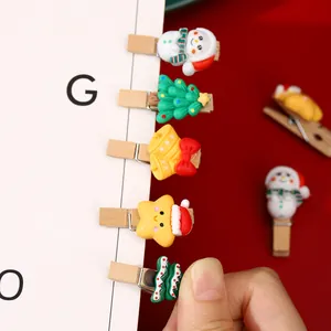 Handmade decorative Christmas wooden clips with cute snowman, tree and bell designs for DIY