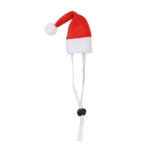Detail view of mini Santa hat for pets featuring adjustable elastic chin strap