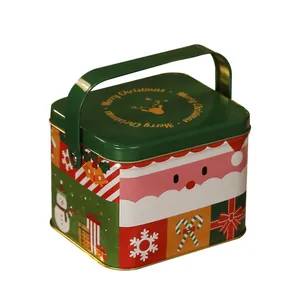Confezione regalo natalizia festiva in latta con manico e design di Babbo Natale per dolci.