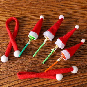 Miniature red felt Santa hats and scarves set for lollipops and wine bottle decoration