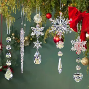 Detailed view of clear acrylic Christmas snowflake and icicle ornaments hanging