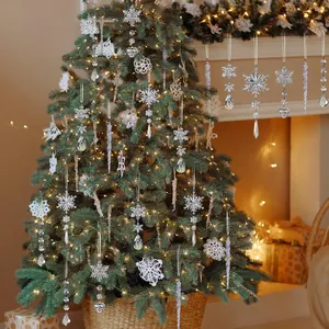 Sparkling acrylic snowflake and icicle ornaments displayed on a festive tree.