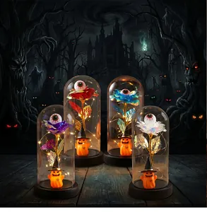 Rosa eterna de Halloween en cúpula con ojo y calabaza decoración temática luz LED.