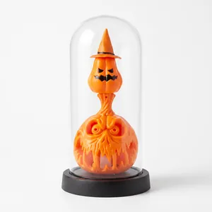 Decorative Halloween pumpkin lantern featuring dual pumpkin stack inside a clear glass dome