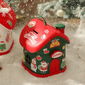 Confezione regalo di Natale a forma di casa con adesivi festivi di pupazzo di neve e Babbo Natale