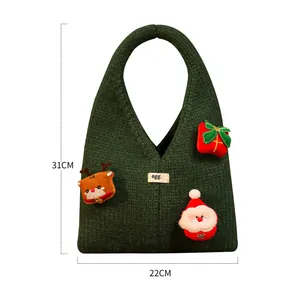 Grüne gestrickte Weihnachts-Geschenktüte mit Weihnachtsmann und Rentier, Größe 31x22cm