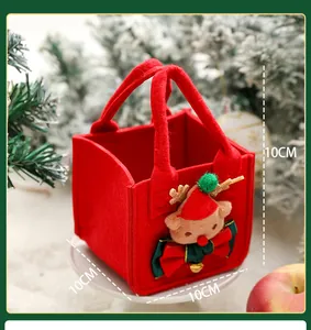 Detail view of red Christmas felt gift bag with reindeer decor and 10cm measurements