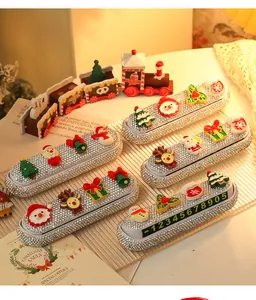 Close-up of Christmas-themed car parking phone number plates with rhinestones
