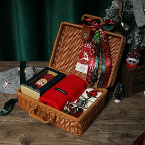 Festive Christmas gift set inside a decorative portable woven wicker suitcase gift box
