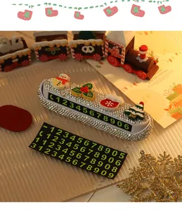 Close-up of sparkling rhinestone Christmas car parking plate with cute festive charms