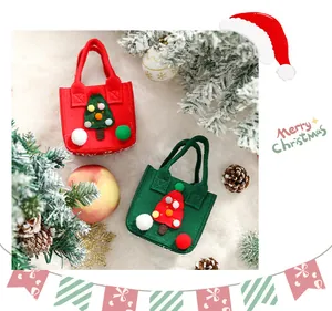 Detailed view of red and green Christmas felt gift bags with festive tree decorations