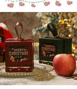 Weihnachtliche Apfel-Geschenkboxen mit Merry Christmas-Design und Ledergriffen