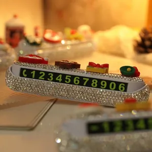 Sparkly rhinestone car parking card featuring cute Christmas figures and green digits