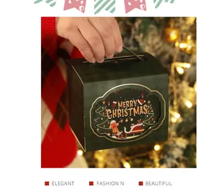 Detailansicht der festlichen grünen Weihnachts-Geschenkbox mit Merry Christmas Fenster