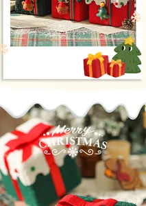Feestelijke rood-groene fluwelen kerstcadeaudozen met rendier- en boomdecoratie