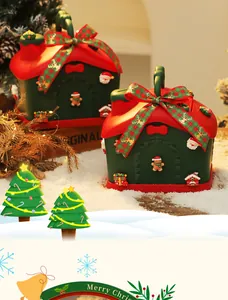 Detailansicht der Weihnachts-Haus-Aufbewahrungsboxen mit Weihnachtsmann und Lebkuchen