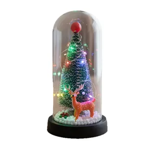 Cúpula de cristal decorativa con mini árbol luminoso y figura de reno festiva