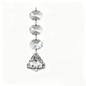 Detailed view of faceted transparent crystal beads and icicle pendant for Christmas decor