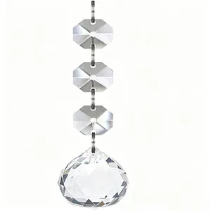 Macro view of clear faceted glass beads for elegant Christmas tree hanging decoration.