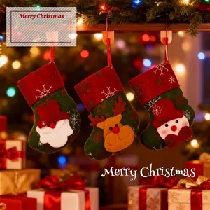 Three mini Christmas stockings with Santa, Reindeer, and Snowman cartoon designs