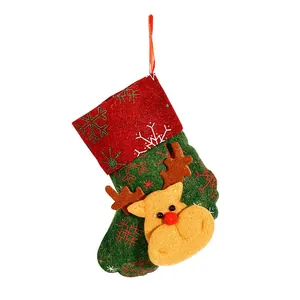 Small Christmas stocking gift bag with cartoon reindeer and snowflake patterns