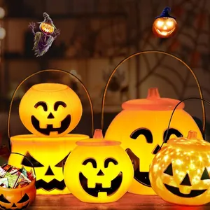 Lanterne di zucca a LED di Halloween e secchielli per caramelle per decorazione