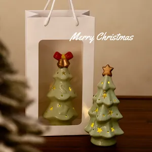 Ceramic Christmas tree night light with warm LED glow and elegant white window gift bag