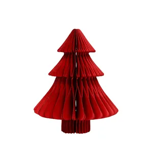 Rode honingraatpapier kerstboom voor feestelijke vakantie en huis interieur decoratie.
