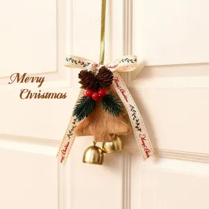 Festive Christmas tree ornament with fuzzy bell, gold bells, and pine cones