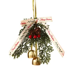 Christmas hanging ornament with pine needles, golden bells, and Merry Christmas ribbon bow