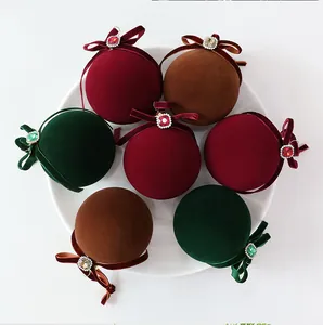 Luxe velvet Christmas ball ornaments with rhinestones in deep red, green, and brown