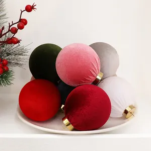 Detail of multi-colored velvet Christmas ornaments with soft texture and elegant colors