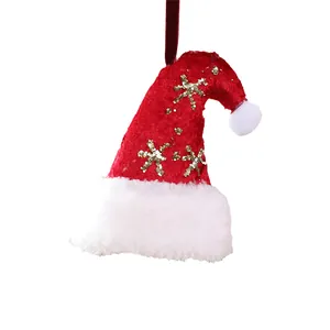 Feestelijke rood-witte fluwelen kerstmuts hanger met gouden glitter sneeuwvlokken
