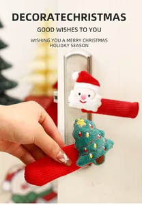 Detailed view of festive plush Santa and Christmas tree knitted door handle covers decoration