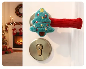 Festive Christmas tree plush decoration on a red knitted door handle cover sleeve