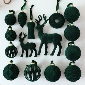Detailed view of dark green flocked Christmas ornaments with velvet texture.