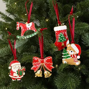 Detailed view of metal enamel Christmas tree ornaments including Santa and reindeer