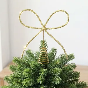 Élégant nœud doré scintillant pour sommet de sapin de Noël avec base en spirale